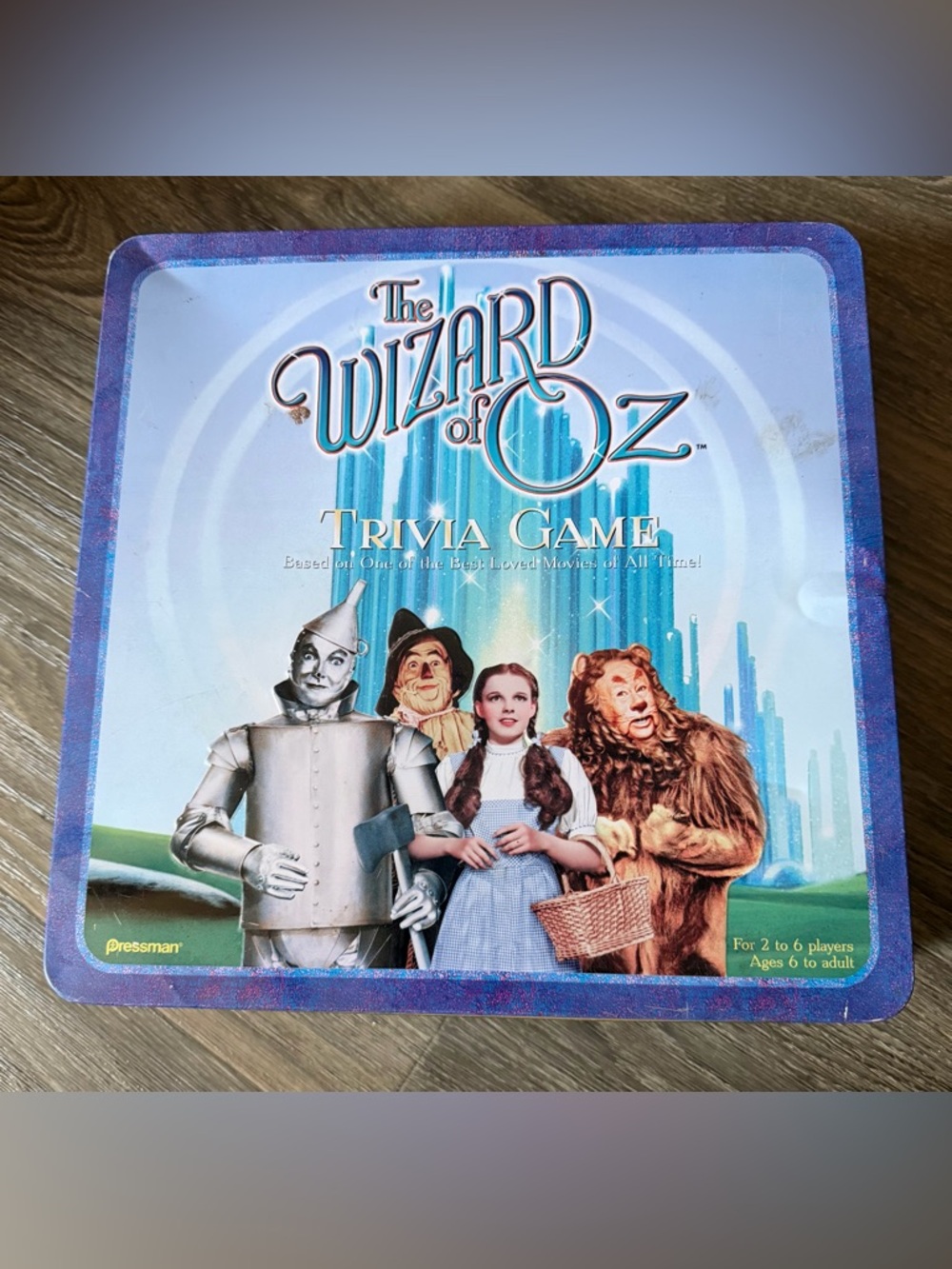 The Wizard of Oz Trivia Game in collective tin